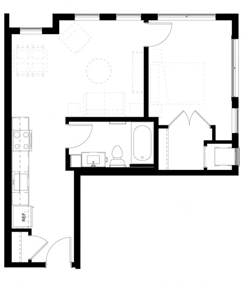 a black and white floor plan of a room with a kitchen and a living room